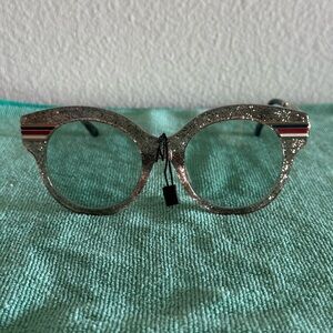 Gucci round glitter frame glasses acetate